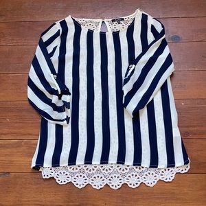Navy blue and white striped blouse